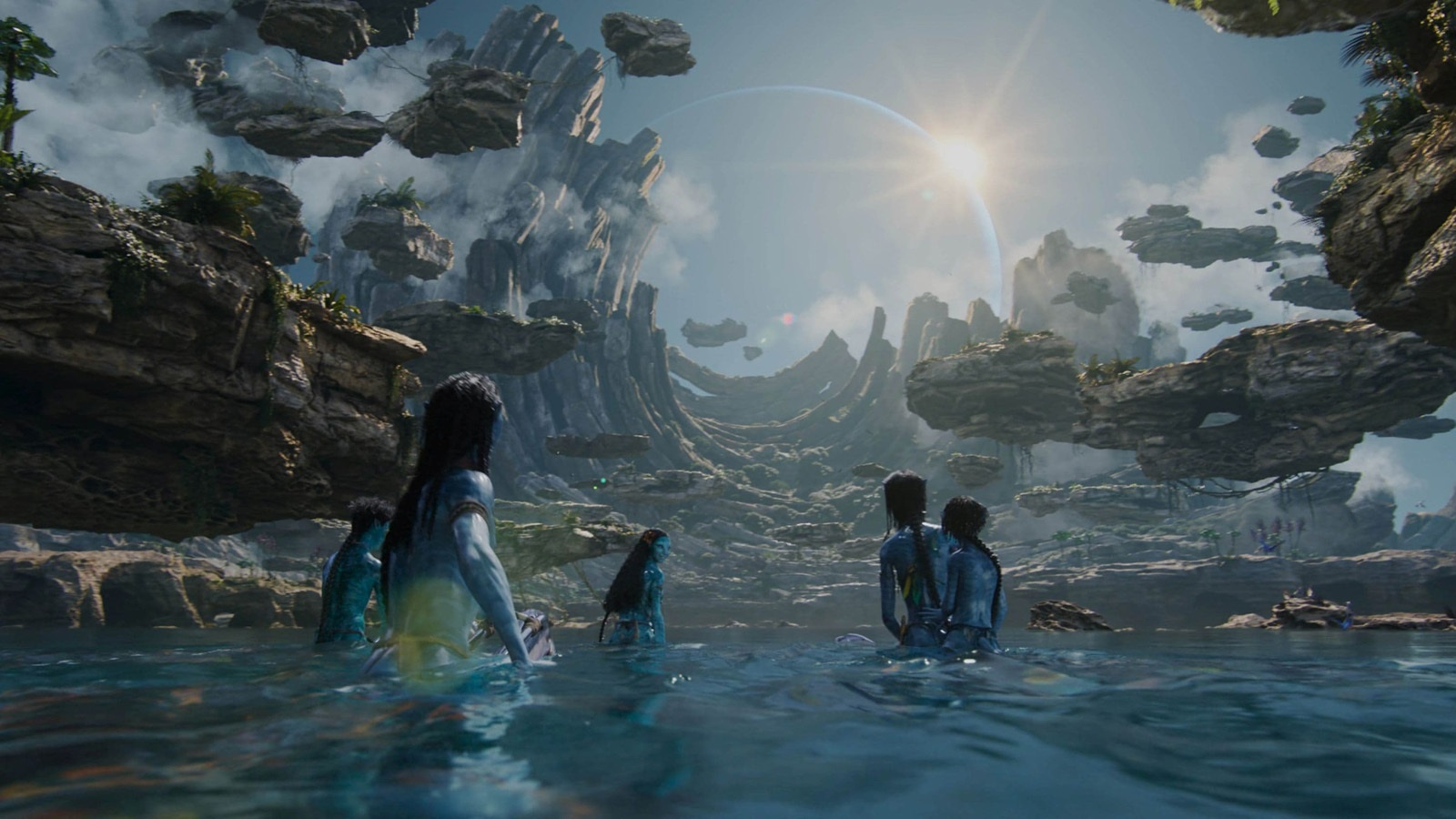Família Na'vi na água em Pandora